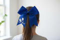 Royal blue Mickey bow worn in hair - back view